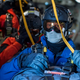 Image for article titled Check Out These Shots Of A C-17 Dropping Pararescuemen Over The Navy's Arctic Outpost